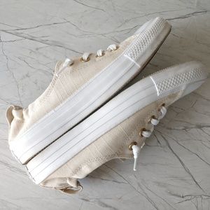 converse shoreline driftwood